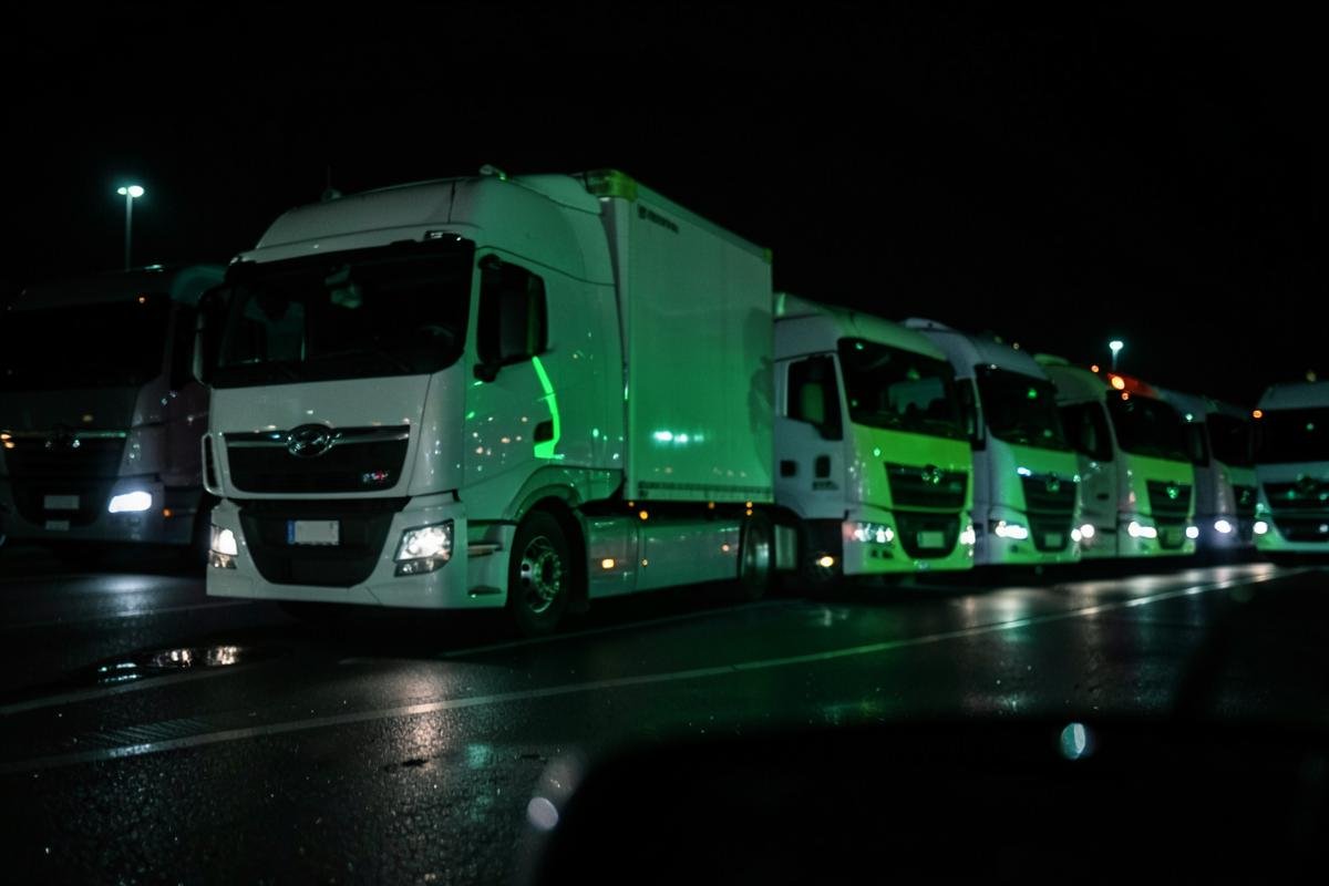 Commercial vehicle fleet at night